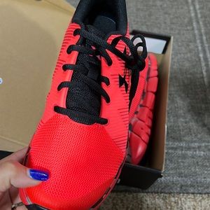 Red brand new size 6 under armour sneakers never worn